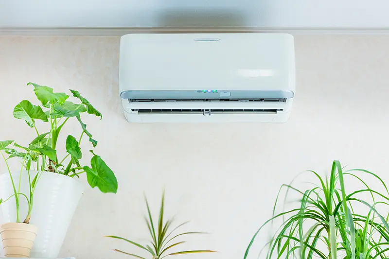 Ductless AC unit mounted on inside wall